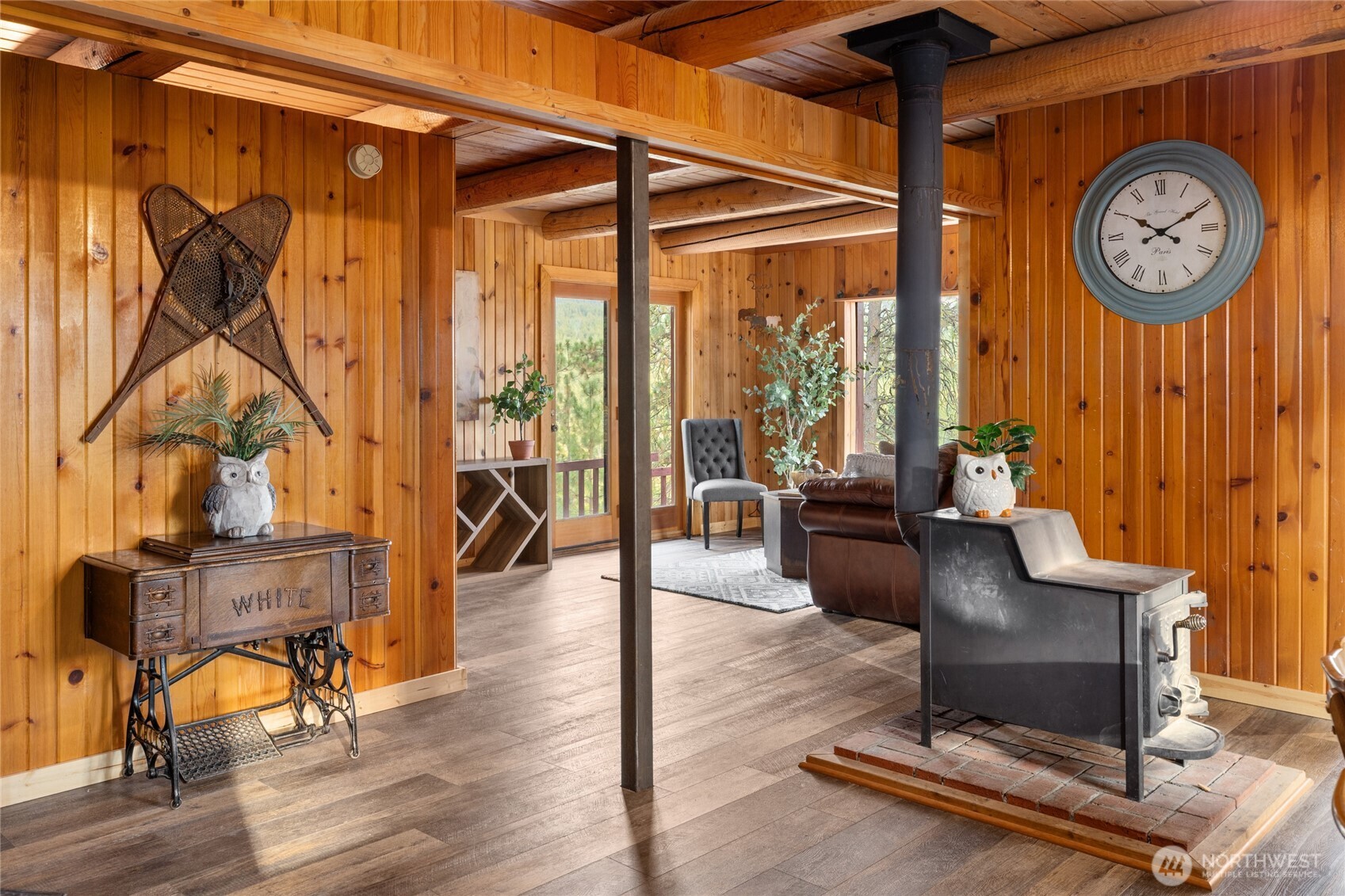 300 Teanaway Ridge Way Cle Elum, WA 98922 - Photo 8 of 38 a living room with furniture a table and wooden floor