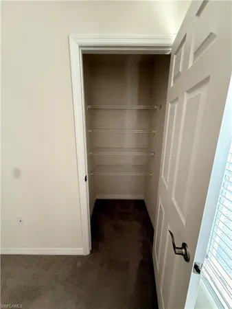 a spacious bathroom with a double vanity sink mirror double and shower