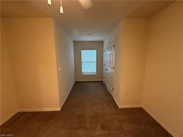 a view of a swimming pool and lounge chair
