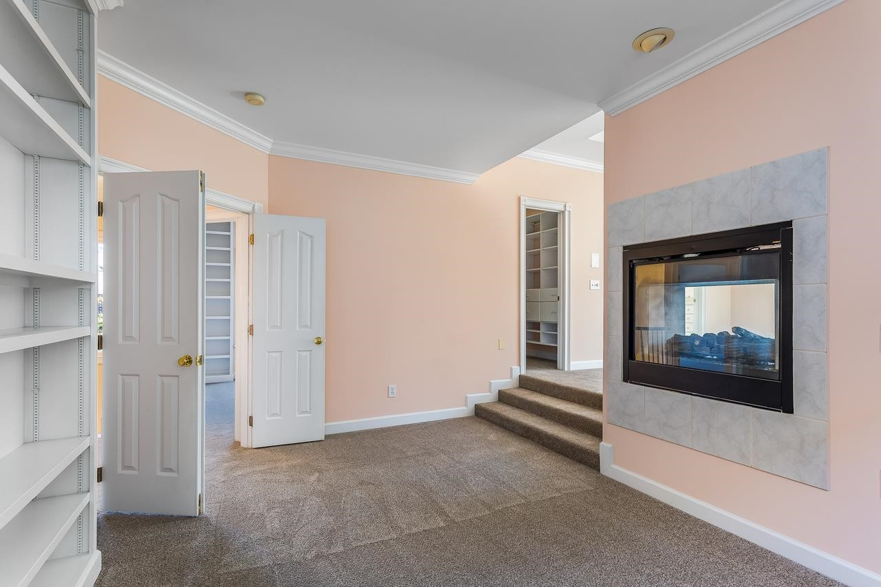 3117 Bentley Hill Road Raleigh, NC 27612 - Photo 19 of 27 Adjoins Master Bedroom with shared fireplace. Brand new carpet through out second floor Sitting Room
