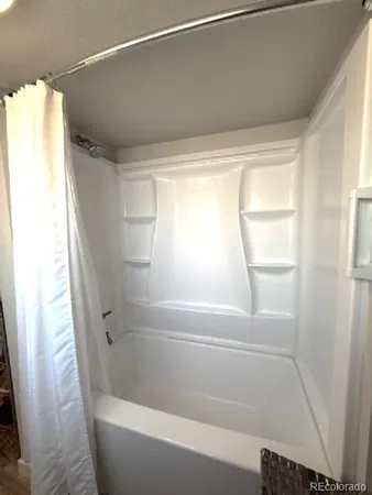 a bathroom with a bathtub