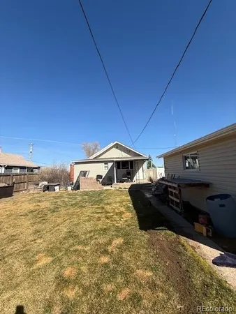 a front view of a house with yard