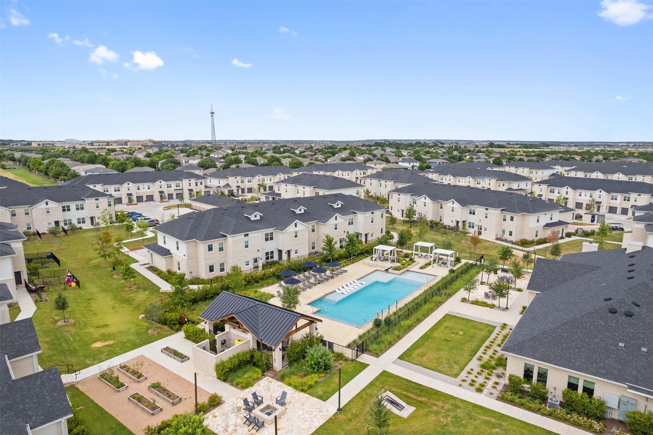 1101 Halsey Drive, Unit 2515 Leander, TX 78641 - Photo 1 of 50 an aerial view of a city with lots of residential buildings