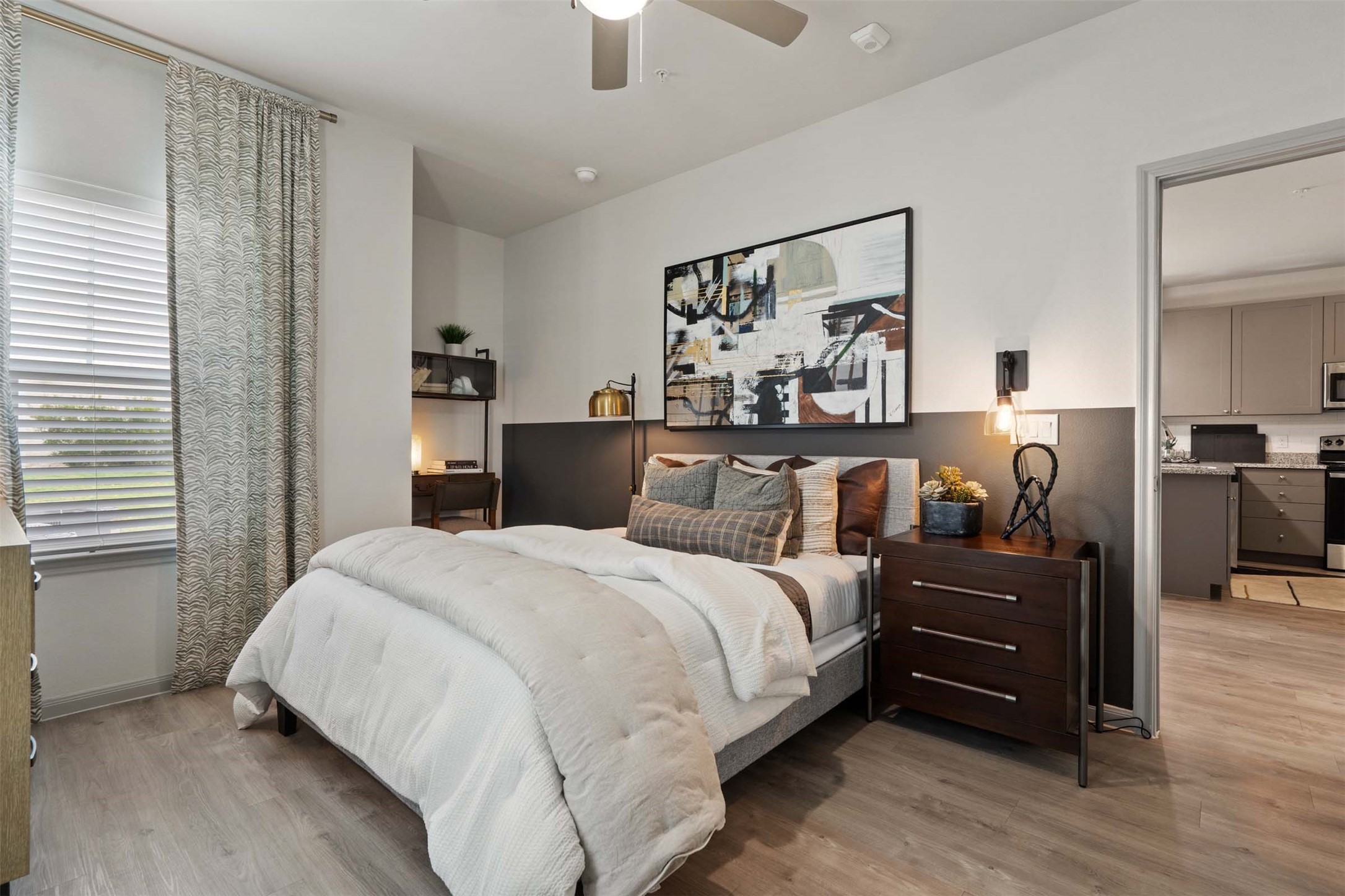 1101 Halsey Drive, Unit 2515 Leander, TX 78641 - Photo 43 of 50 a bedroom with a bed and wooden floor