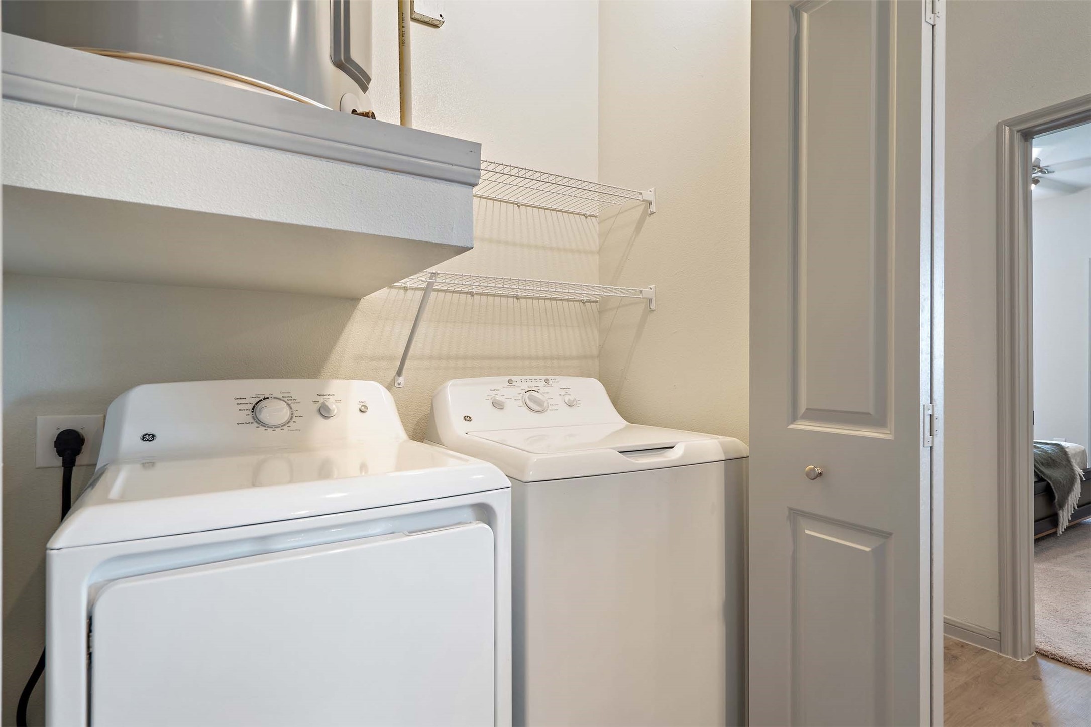 1101 Halsey Drive, Unit 2515 Leander, TX 78641 - Photo 49 of 50 a utility room with dryer and washer