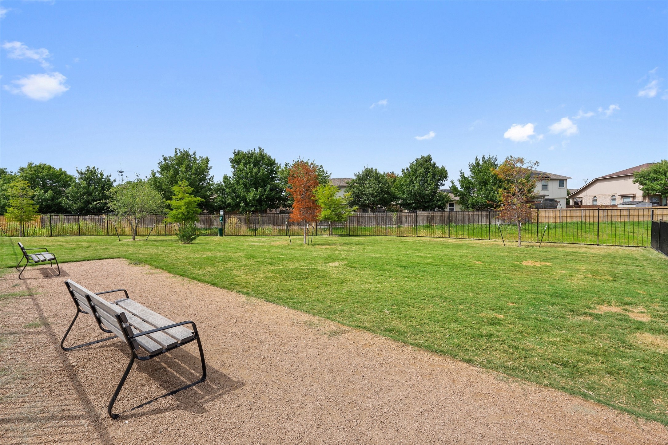 1101 Halsey Drive, Unit 2515 Leander, TX 78641 - Photo 9 of 50 a view of a swimming pool and lounge chairs