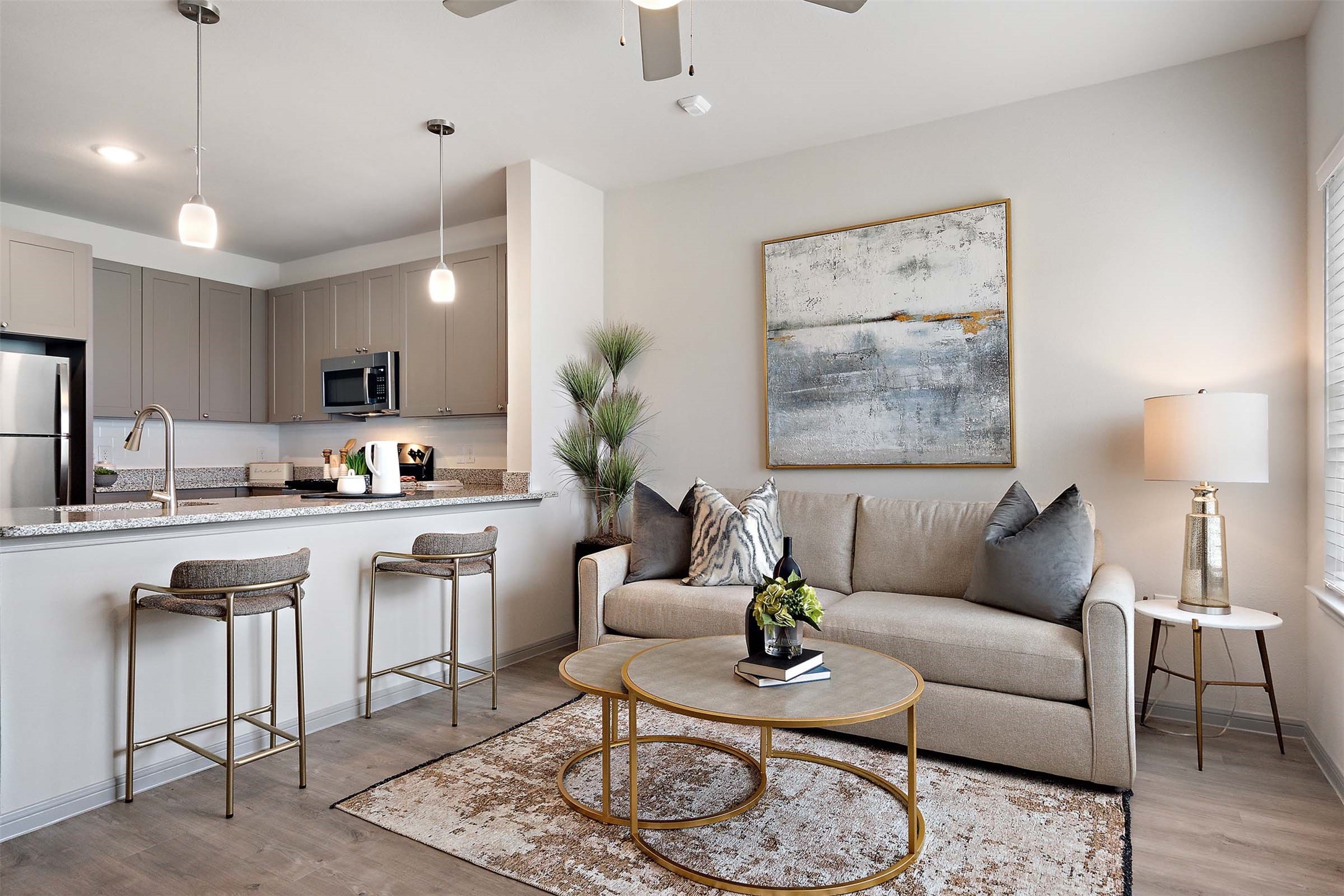 1101 Halsey Drive, Unit 2515 Leander, TX 78641 - Photo 35 of 50 a living room with furniture a lamp kitchen view and a table