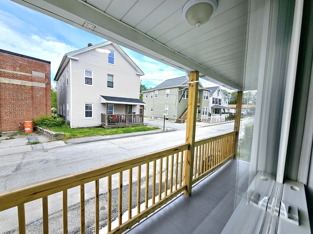 9 Wellington Street Webster, MA 01570 - Photo 20 of 37 a view of a porch