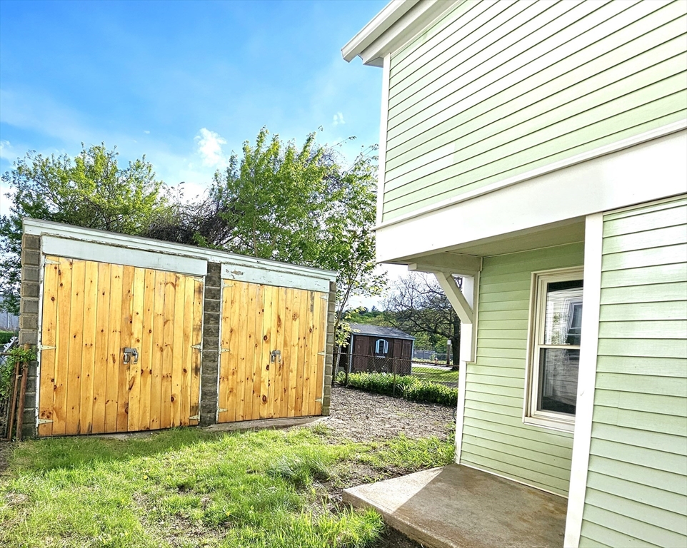 9 Wellington Street Webster, MA 01570 - Photo 22 of 37 a view of backyard with garden