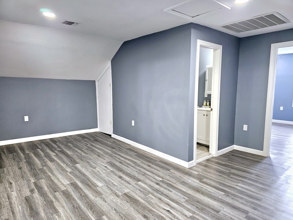 9 Wellington Street Webster, MA 01570 - Photo 28 of 37 a view of room wooden floor and window