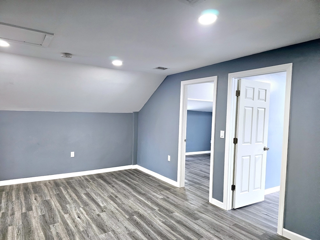 9 Wellington Street Webster, MA 01570 - Photo 29 of 37 a view of empty room with wooden floor