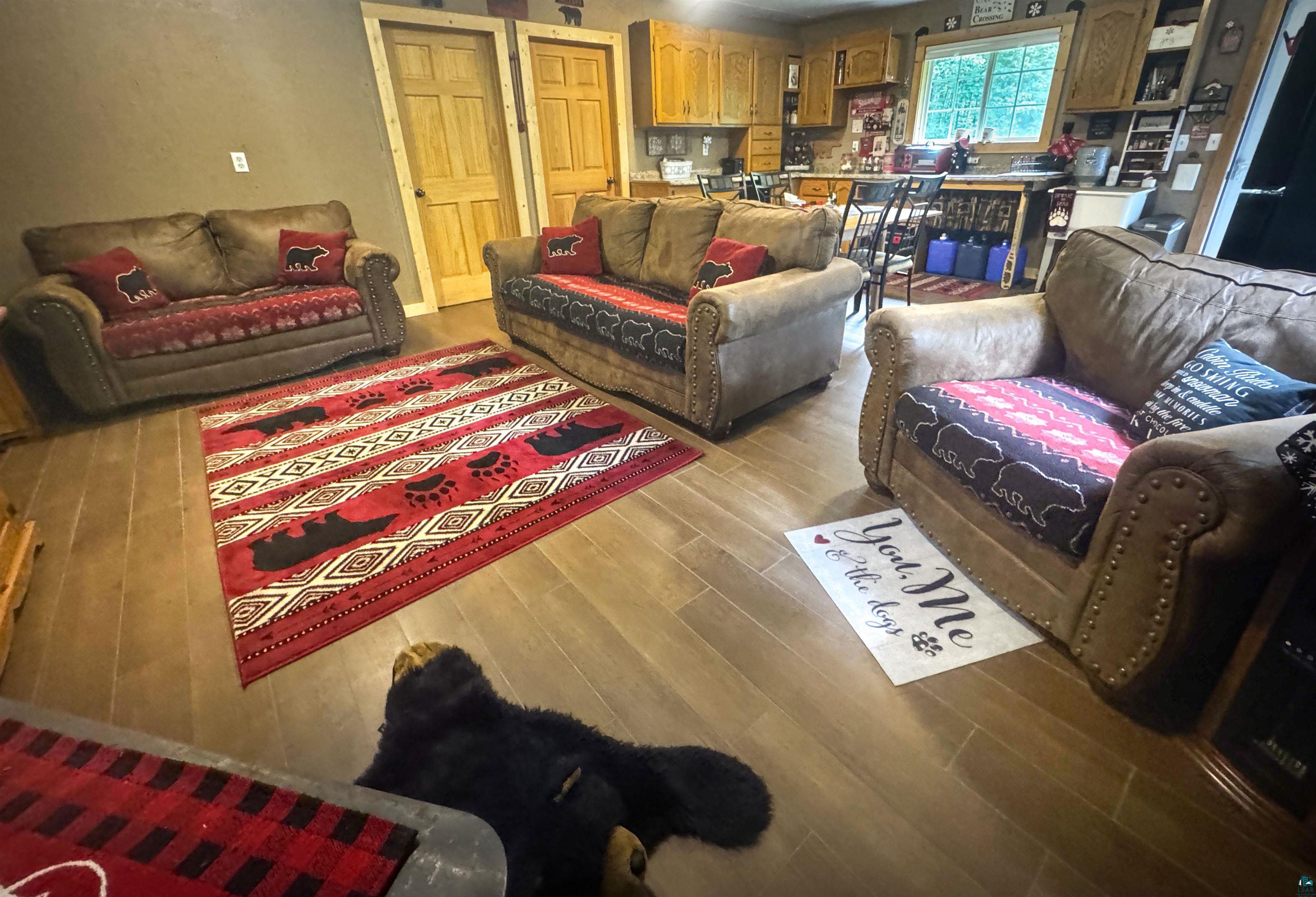 88215 Stage Road Cornucopia, WI 54827 - Photo 7 of 17 Living room with wood finished floors