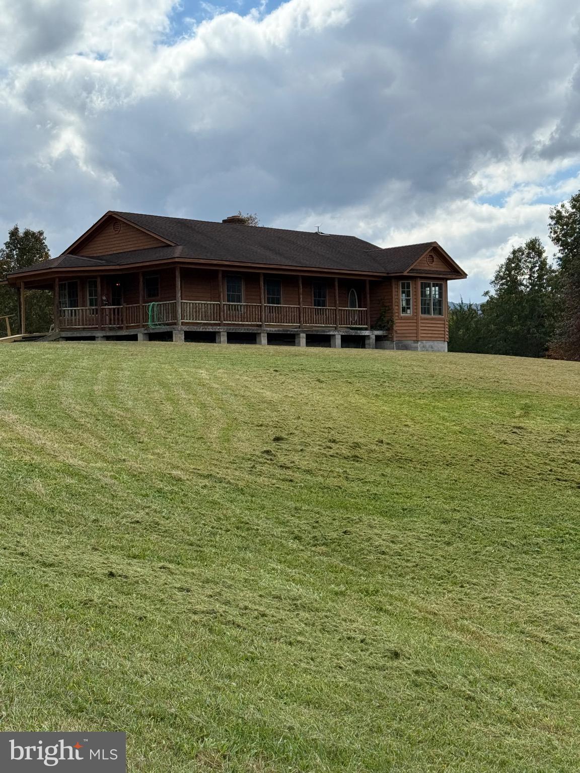 4520 St Davids Church Road Fort Valley, VA 22652 - Photo 1 of 6 a front view of a house with a yard
