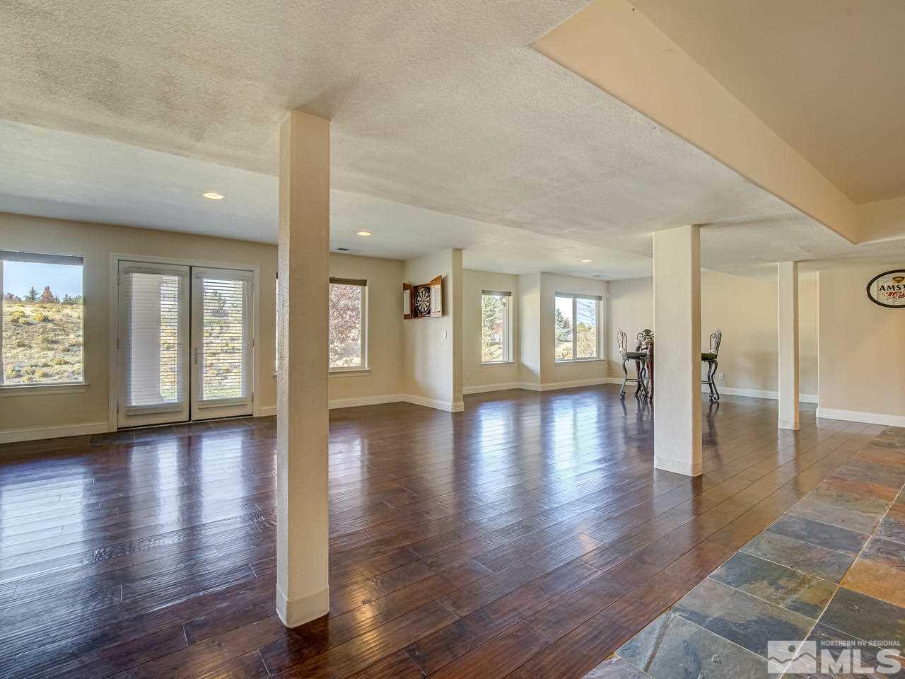 3225 Marthiam Avenue Reno, NV 89509 - Photo 18 of 25 a view of an entryway with wooden floors and garden