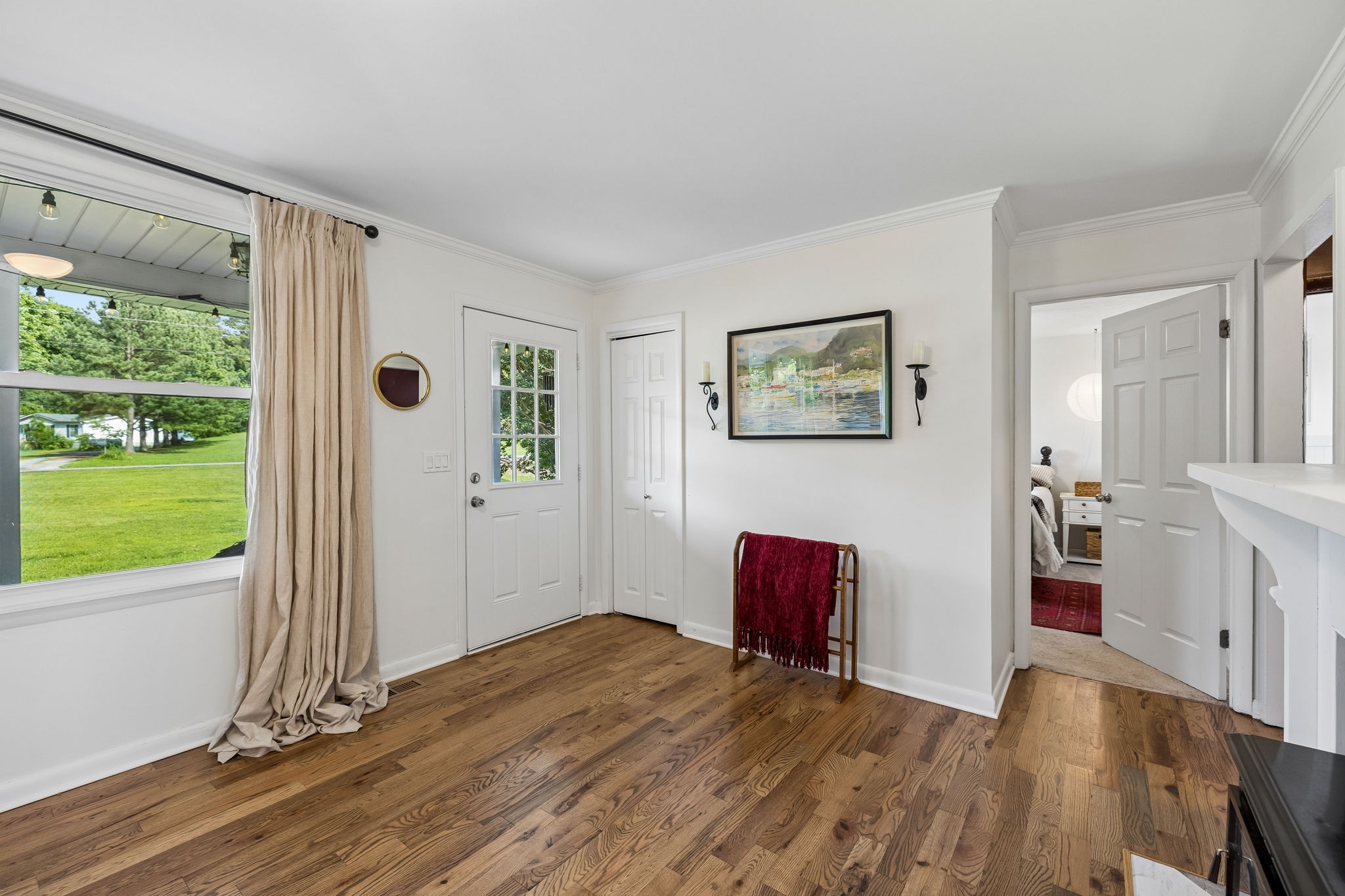 1326 Shahan Road Pleasant View, TN 37146 - Photo 6 of 41 a view of a bedroom with window and wooden floor
