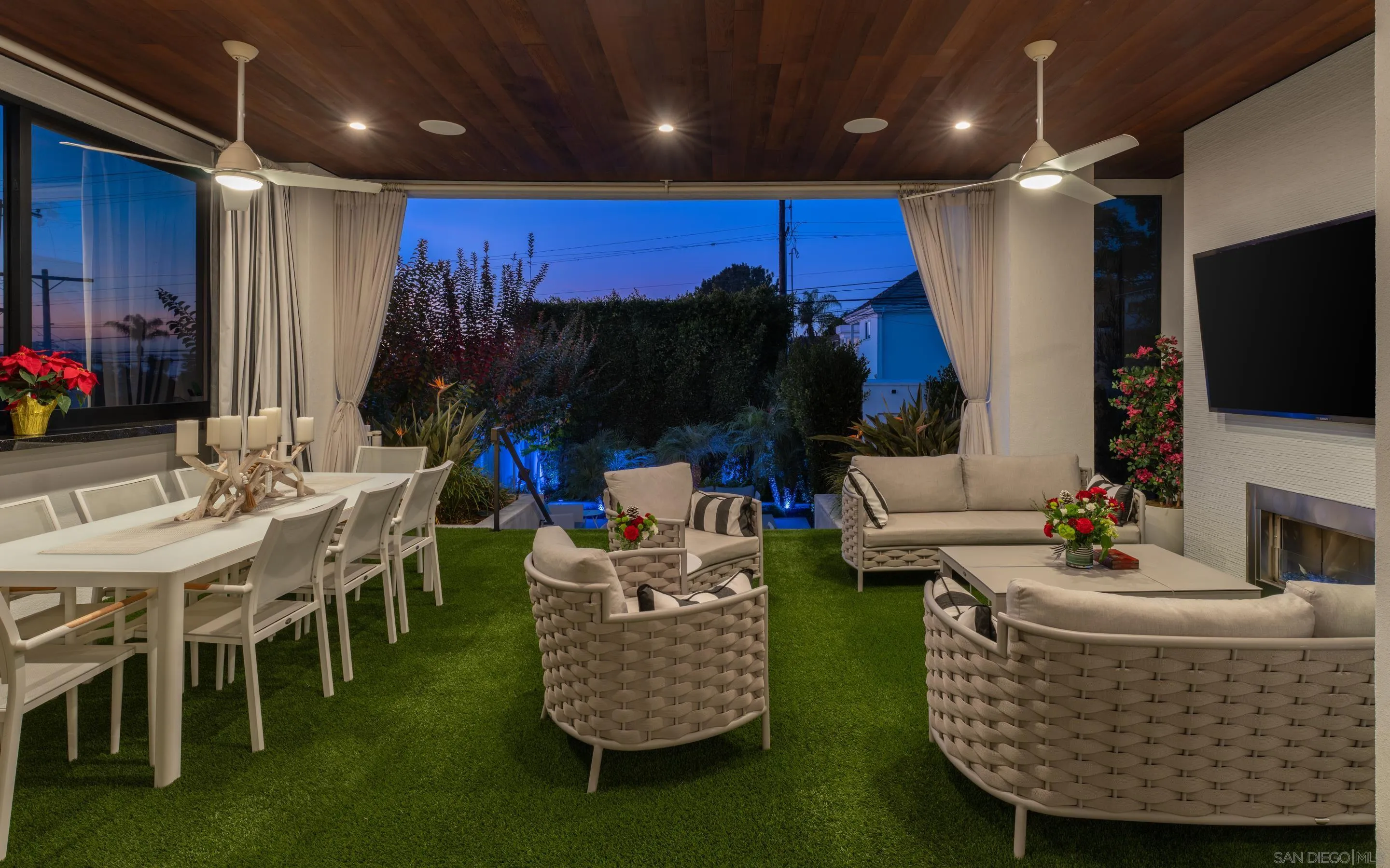 1224 Virginia Way La Jolla, CA 92037 - Photo 14 of 45 a living room with furniture and a flat screen tv