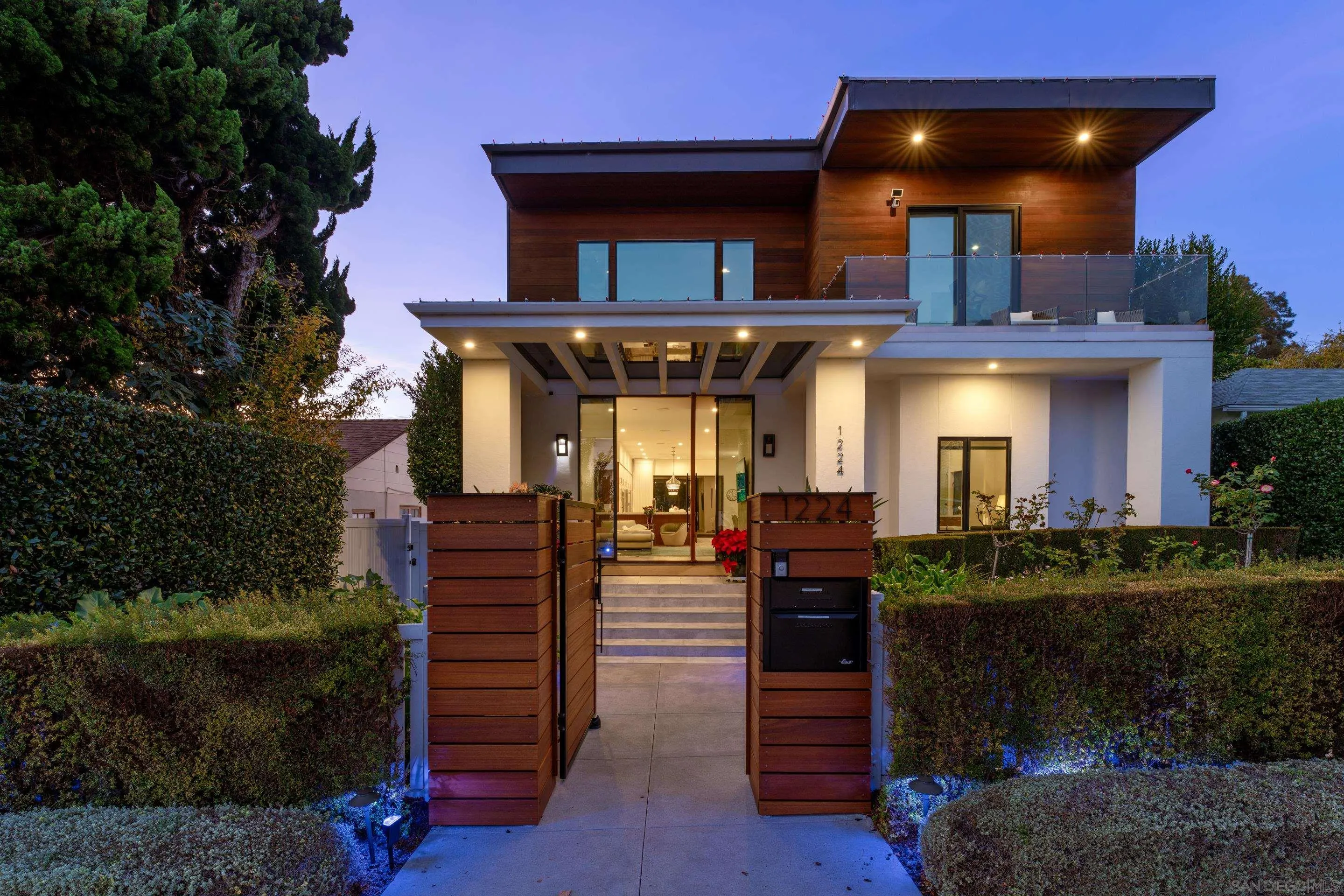 1224 Virginia Way La Jolla, CA 92037 - Photo 2 of 45 a front view of a house with a yard