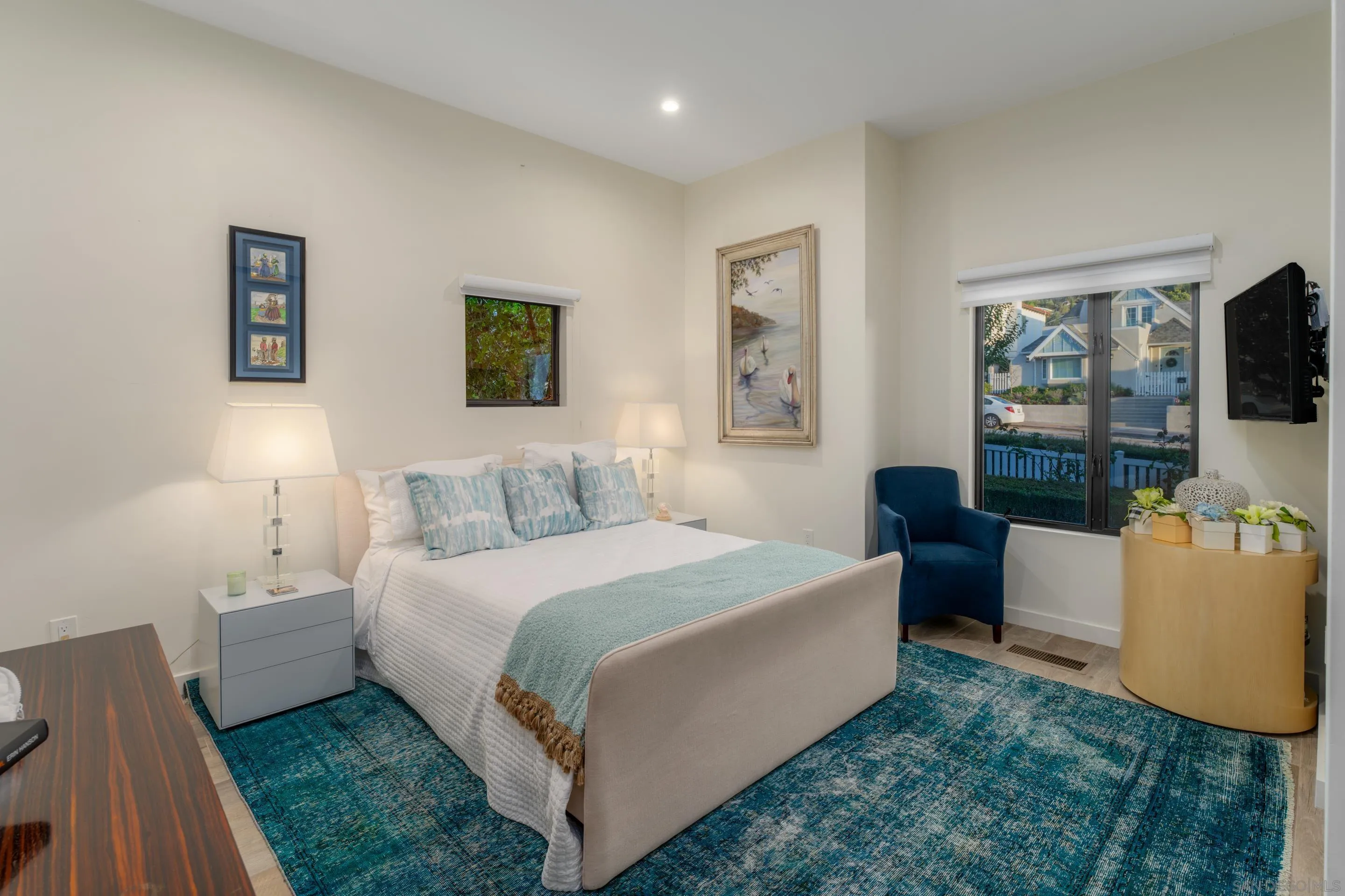 1224 Virginia Way La Jolla, CA 92037 - Photo 38 of 45 a bedroom with a bed and a couch