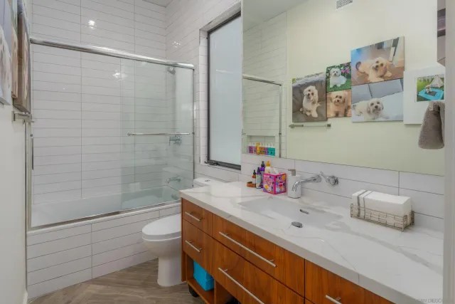 a bathroom with a sink and mirror