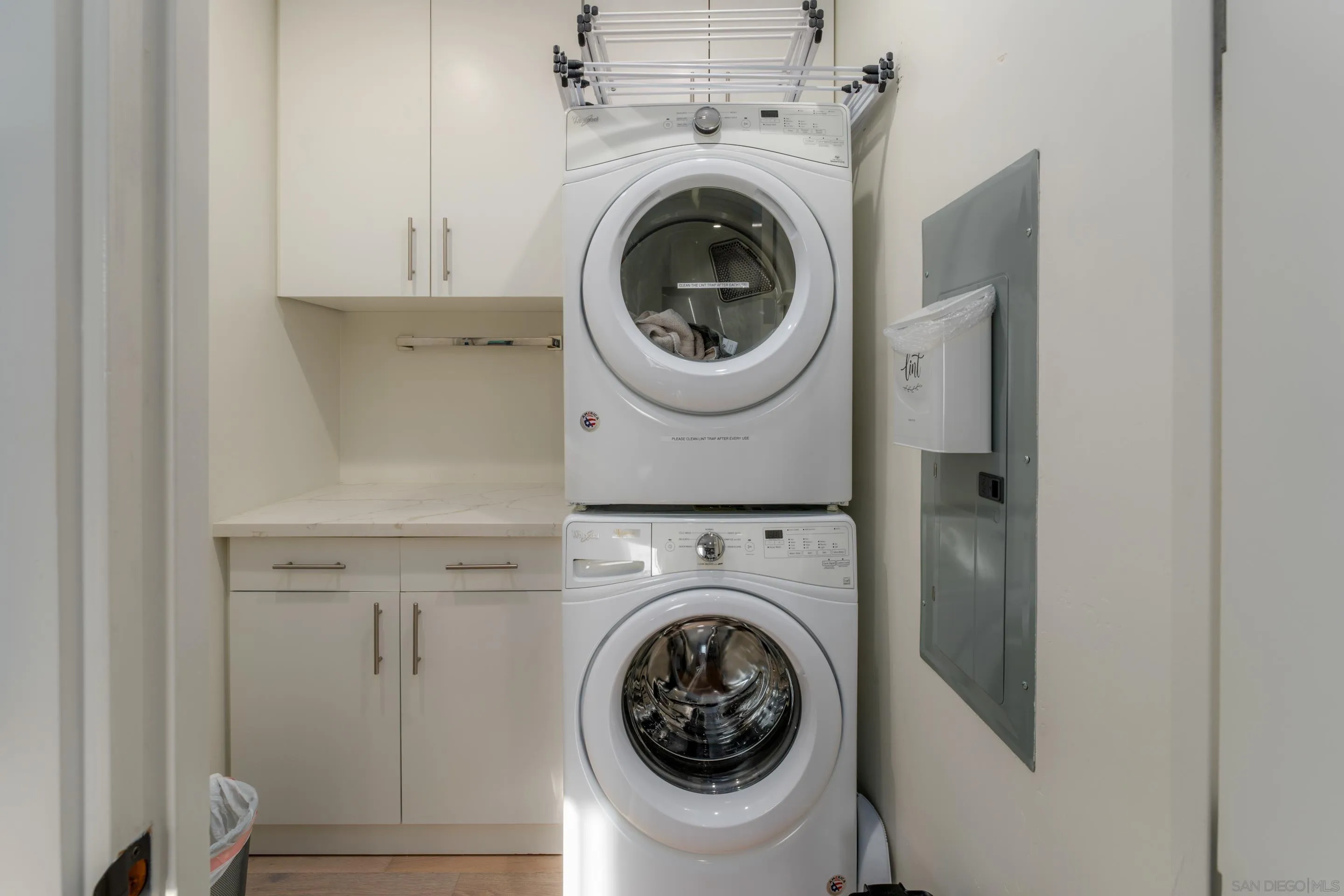 1224 Virginia Way La Jolla, CA 92037 - Photo 43 of 45 a utility room with dryer and washer