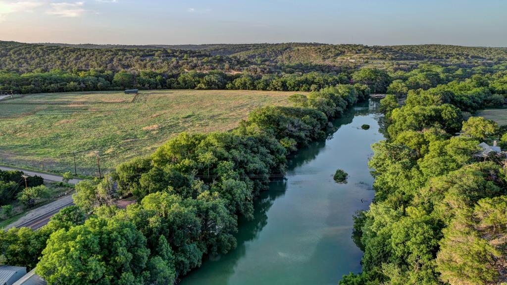 157 Cedar Cliff Loop West Hunt, TX 78024 - Photo 13 of 35 an aerial view of ocean with residential houses with outdoor space and trees