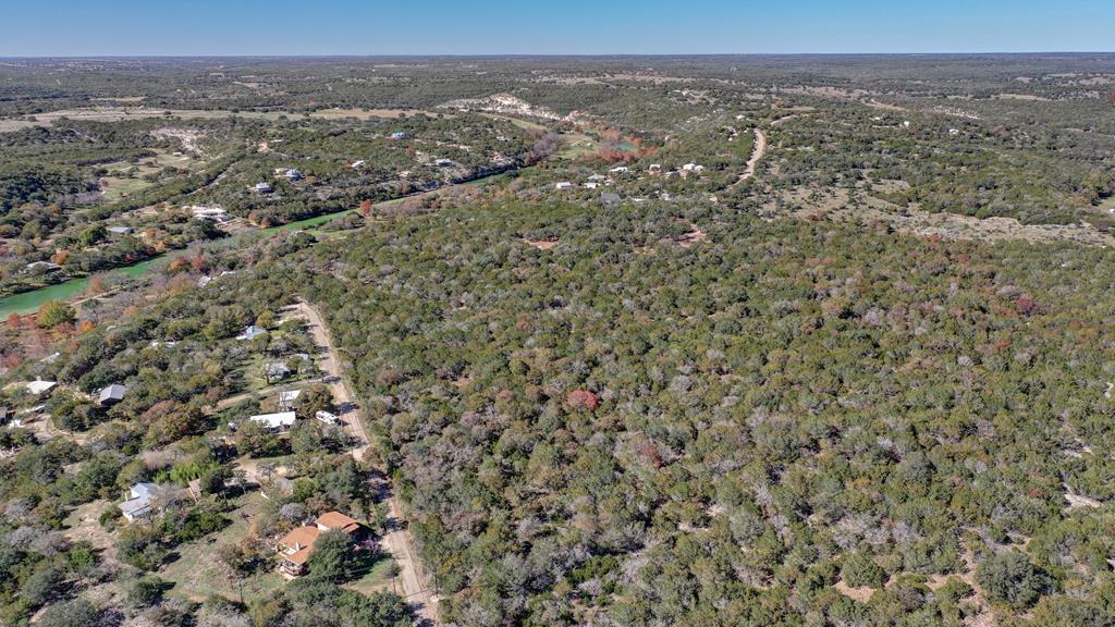 157 Cedar Cliff Loop West Hunt, TX 78024 - Photo 14 of 35 an aerial view of house with yard and mountain view in back