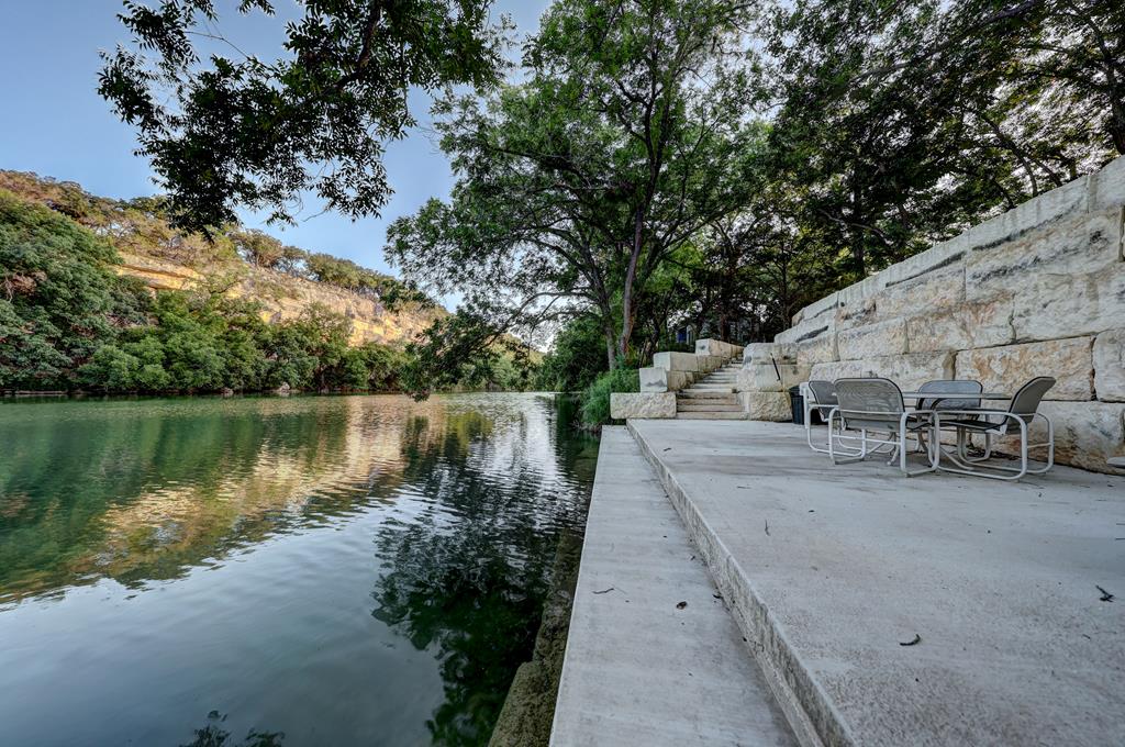 157 Cedar Cliff Loop West Hunt, TX 78024 - Photo 9 of 35 a view of a wooden floor and a yard