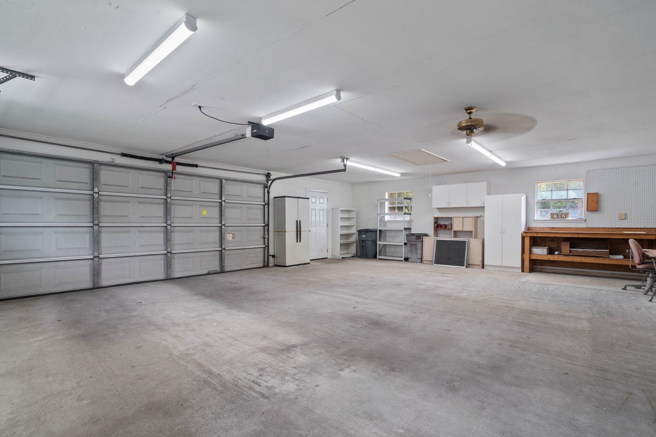 702 3rd Street Humble, TX 77338 - Photo 17 of 44 Shelving and storage spaces will convey in this 24X30 garage (please measure for accuracy if important).