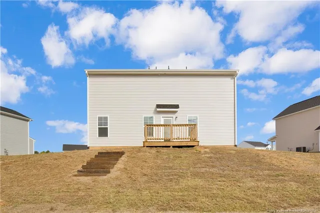 a view of backyard of a house