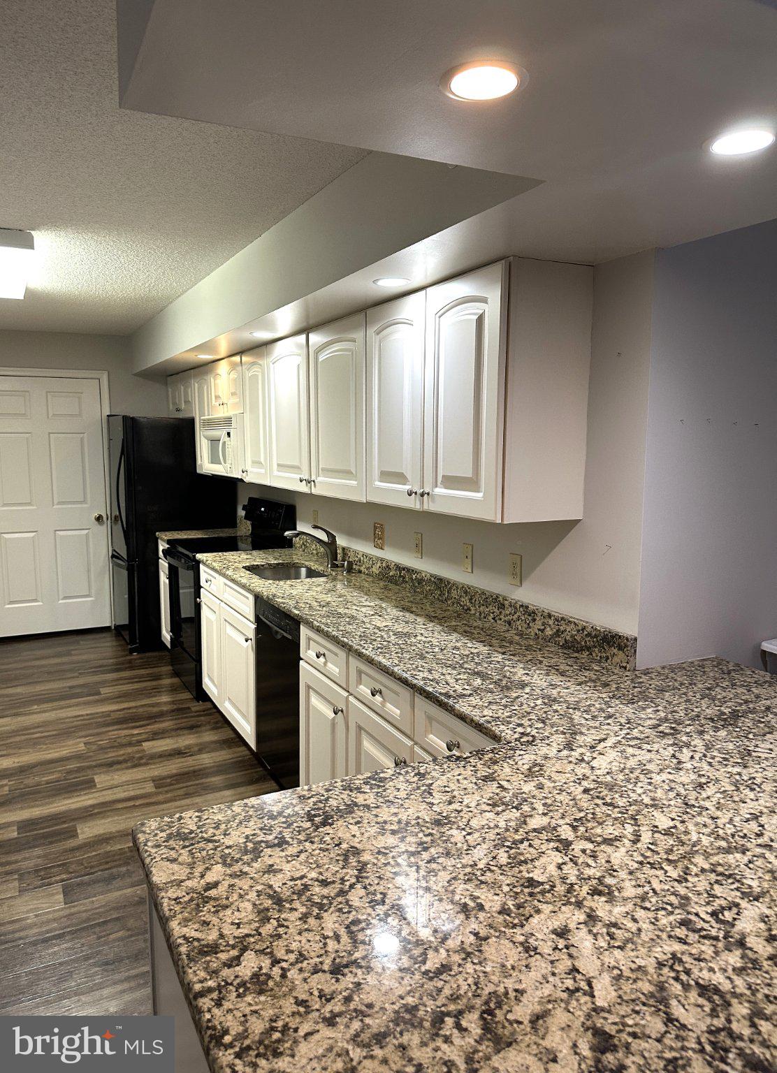 613 Brandon Road Norristown, PA 19403 - Photo 5 of 22 Modern kitchen with granite countertop.