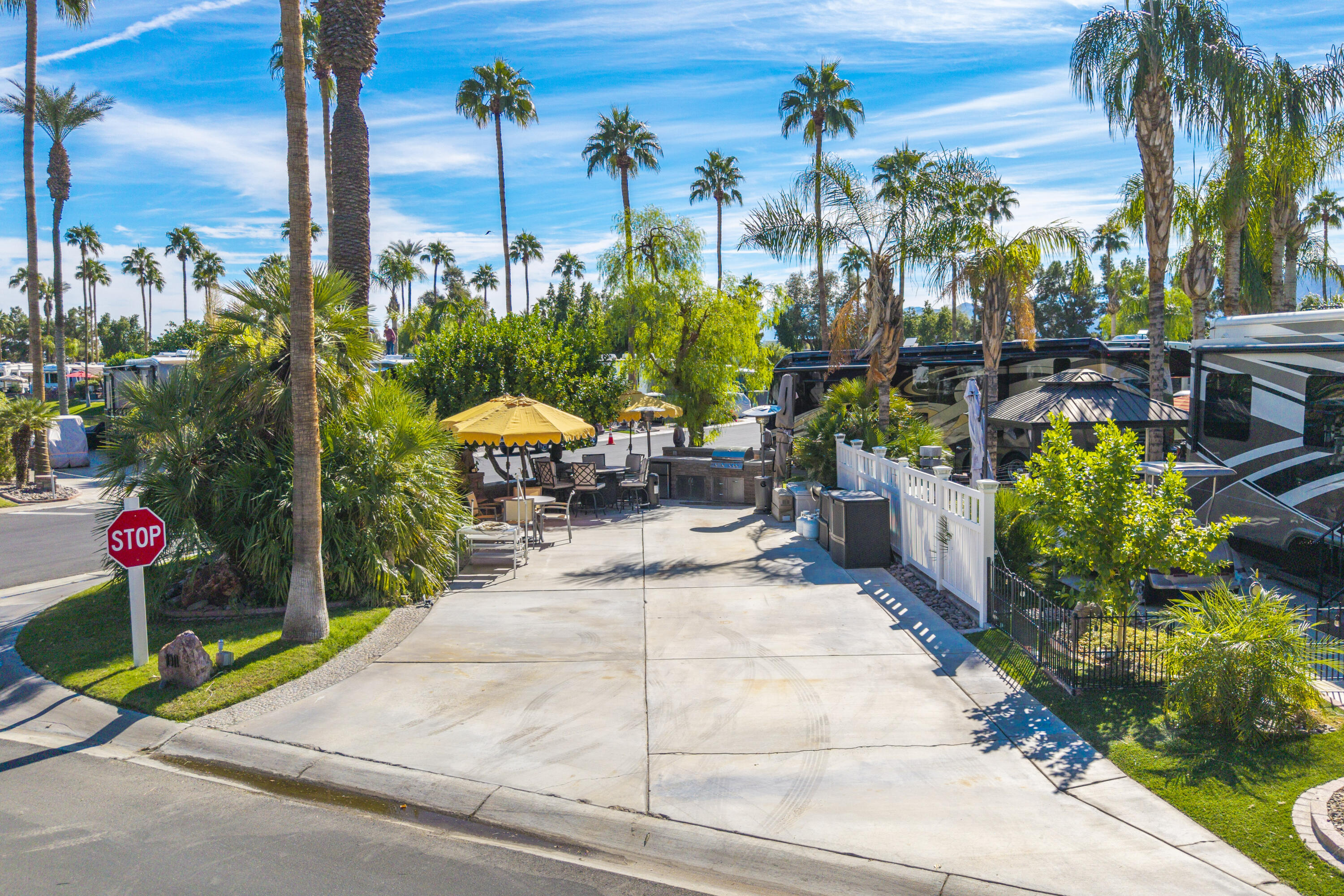 69411 Ramon Road, Unit 1011 Cathedral City, CA 92234 - Photo 9 of 46 a view of a backyard with a patio