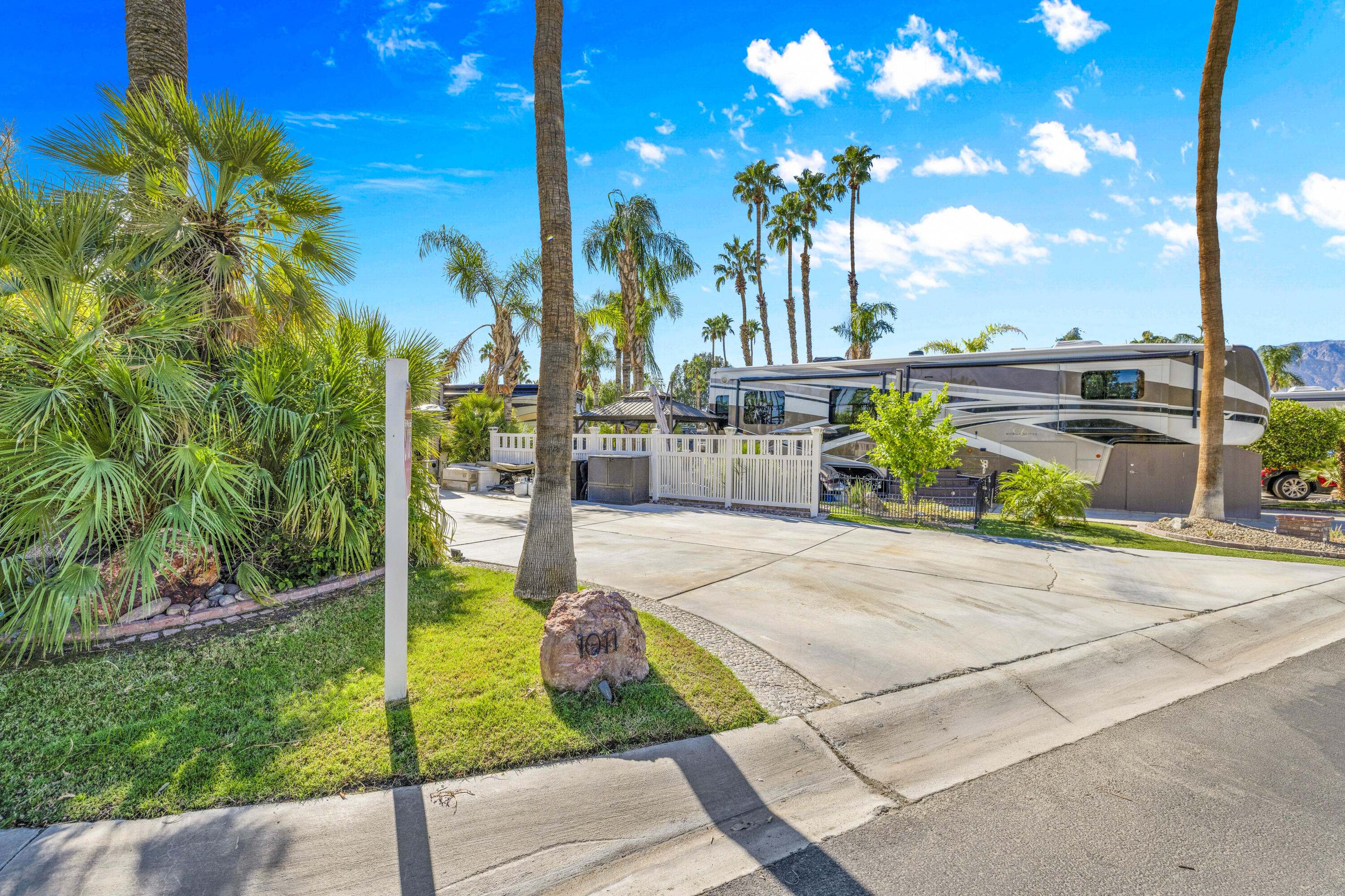 69411 Ramon Road, Unit 1011 Cathedral City, CA 92234 - Photo 10 of 46 a view of a park with potted plants