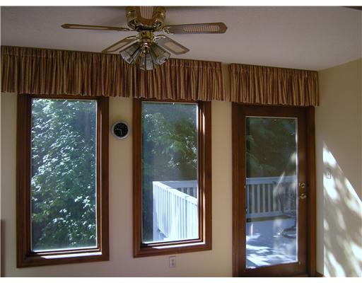 323 Blue Run Road Cheswick, PA 15024 - Photo 6 of 13 Sunroom. Sun Room off of kitchen and great room with door to the deck.