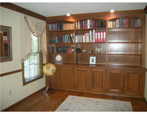 323 Blue Run Road Cheswick, PA 15024 - Photo 9 of 13 Den. First floor den with wall of built-in bookcases