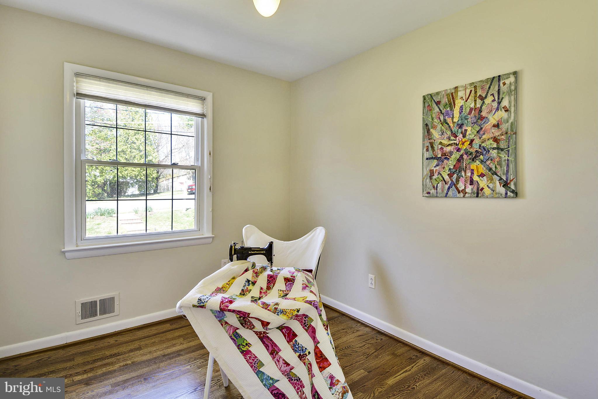 1954 Foxhall Road McLean, VA 22101 - Photo 17 of 30 a bedroom with a bed and wooden floor
