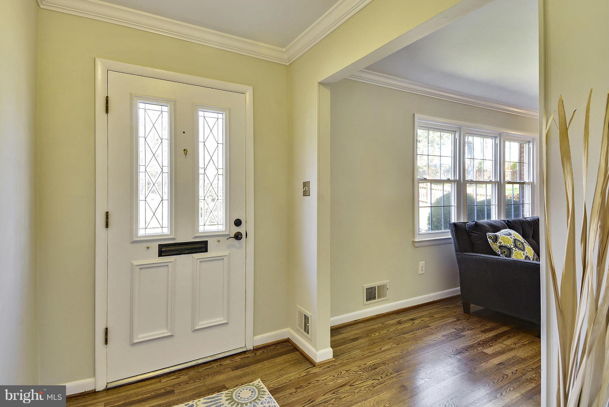 1954 Foxhall Road McLean, VA 22101 - Photo 3 of 30 a view of an empty room and wooden floor