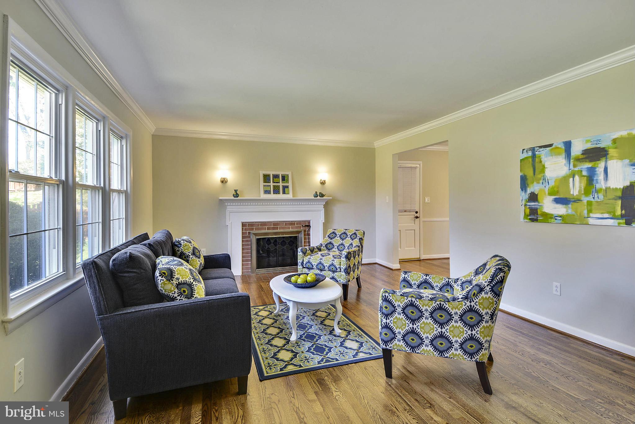 1954 Foxhall Road McLean, VA 22101 - Photo 4 of 30 a living room with furniture and a fireplace