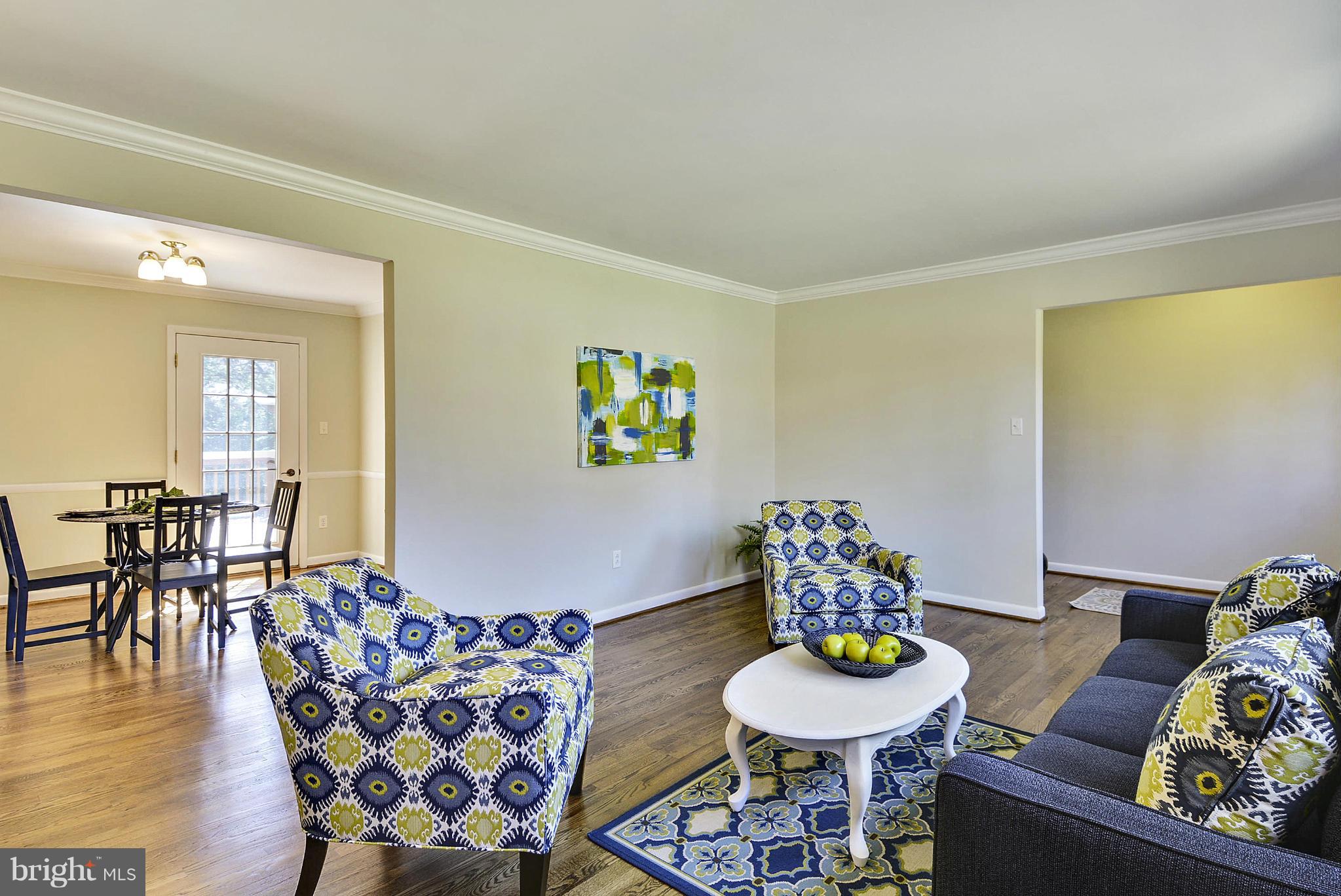 1954 Foxhall Road McLean, VA 22101 - Photo 5 of 30 a living room with furniture and a dining room