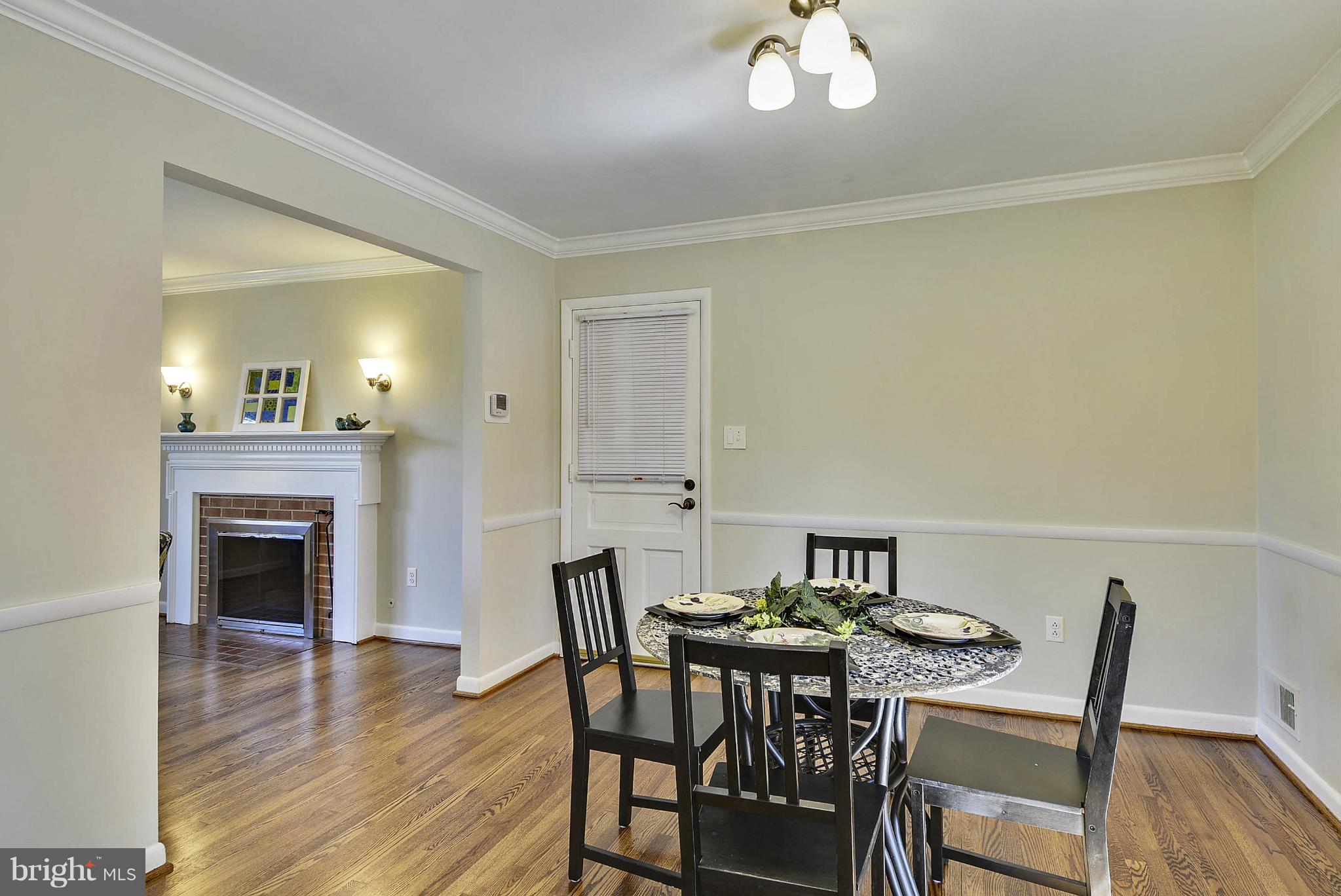 1954 Foxhall Road McLean, VA 22101 - Photo 6 of 30 a view of a dining room with furniture and wooden floor
