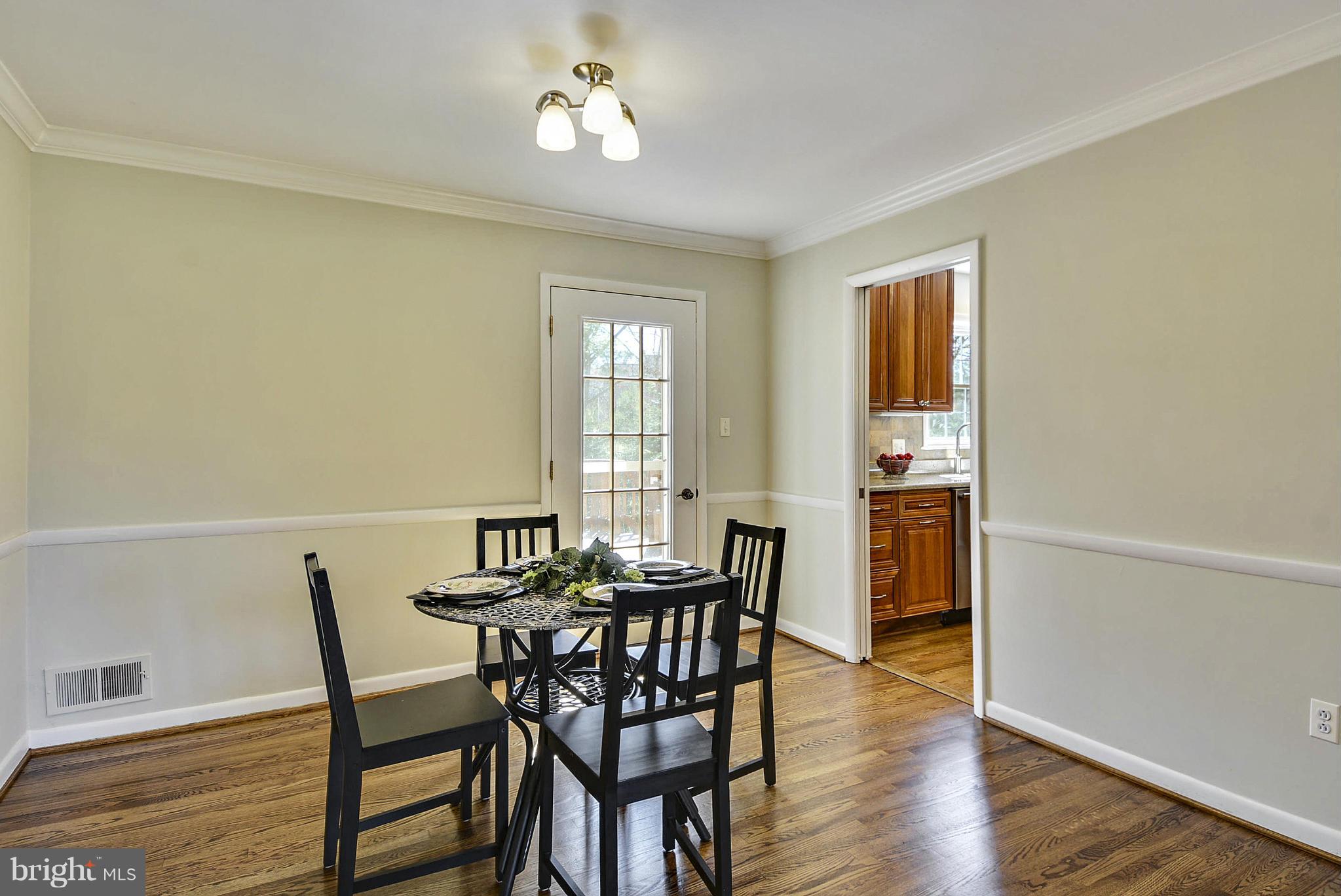 1954 Foxhall Road McLean, VA 22101 - Photo 7 of 30 a view of a dining room with furniture and wooden floor