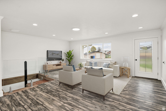 4155 Johnson Road Nibley, UT 84321 - Photo 5 of 71 Virtually staged. Spacious living area featuring wood-finish flooring, recessed lighting, and a decorative glass-paneled entry door