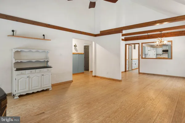 a view of livingroom with furniture and a fireplace