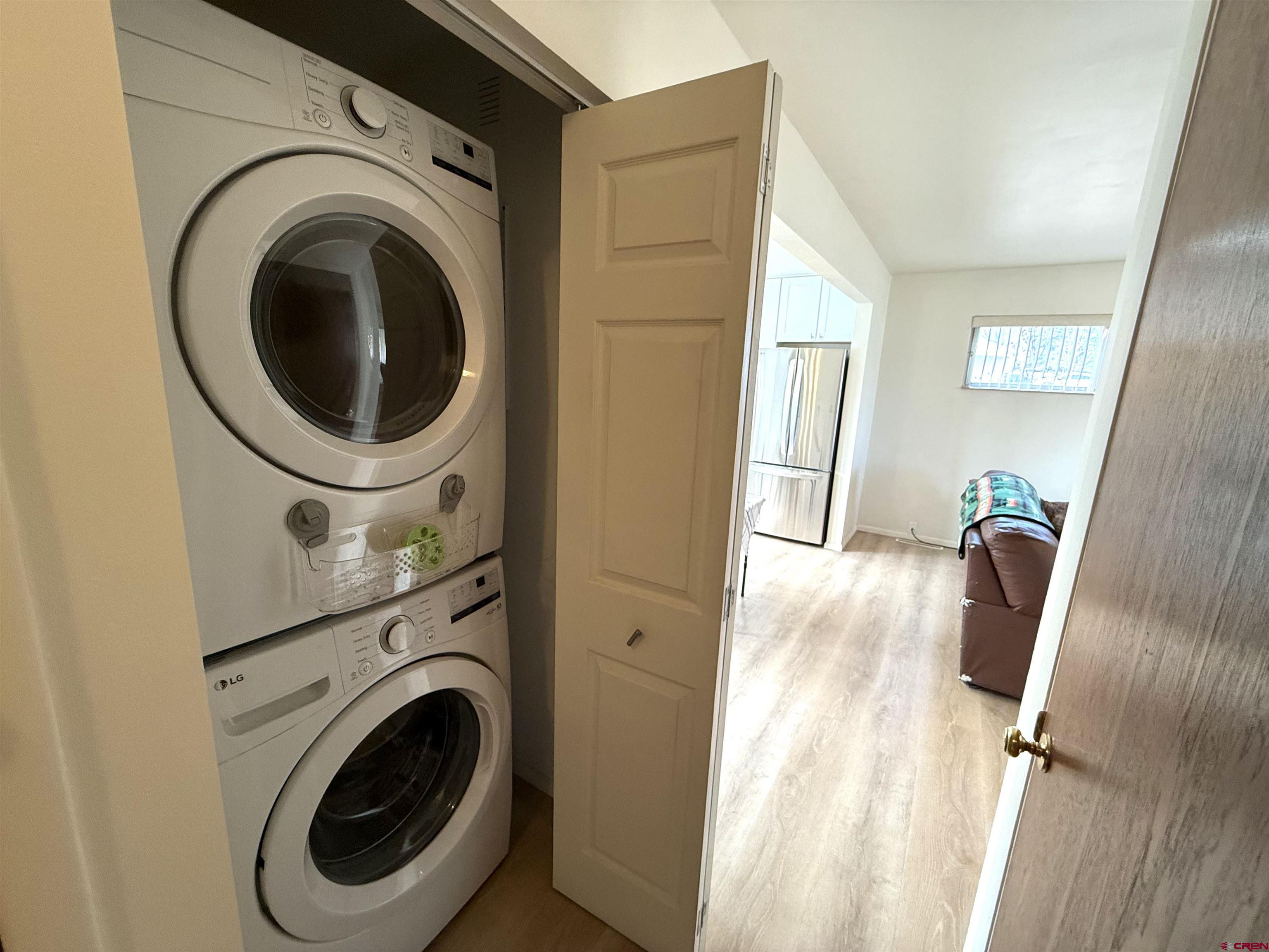 801 East 3rd Street Cortez, CO 81321 - Photo 16 of 22 a view of a hallway with washer and dryer