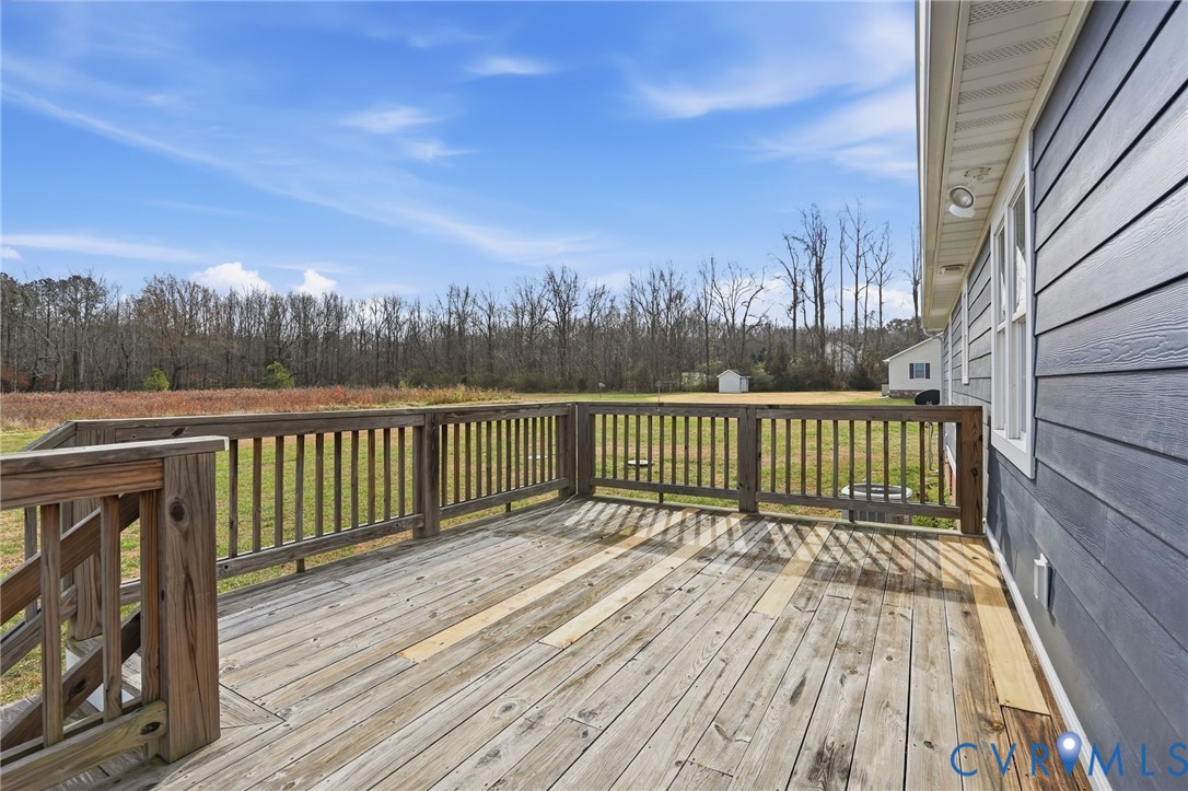 1220 Walkerton Road Walkerton, VA 23177 - Photo 26 of 33 a view of a balcony with a swing