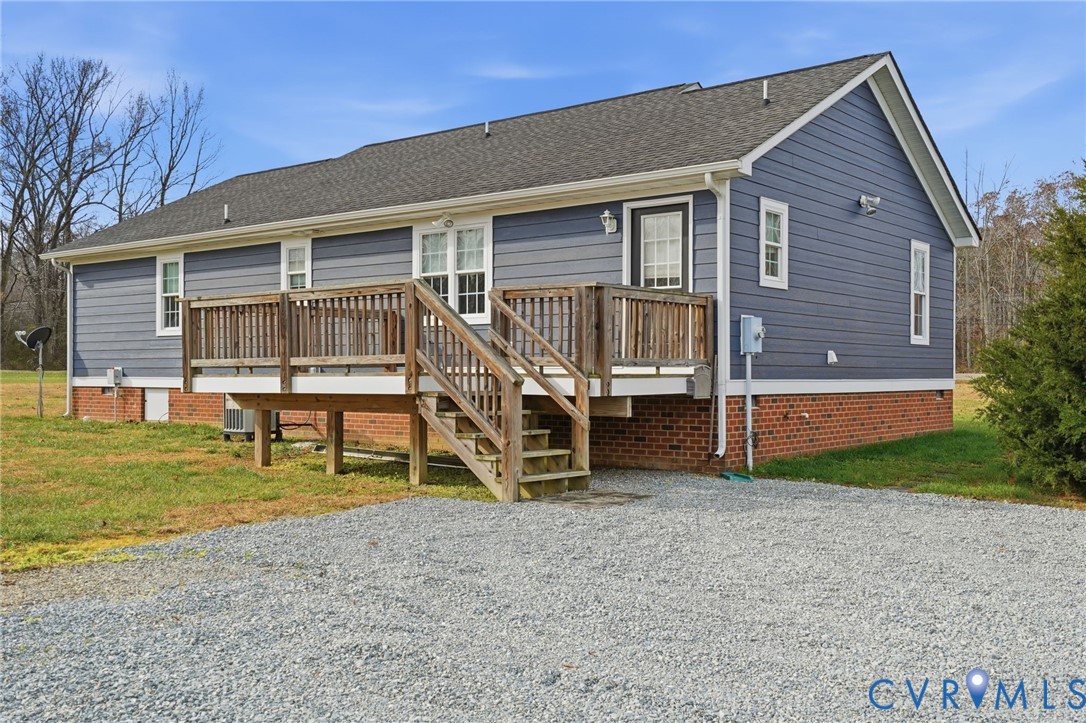 1220 Walkerton Road Walkerton, VA 23177 - Photo 27 of 33 a house view with a backyard space