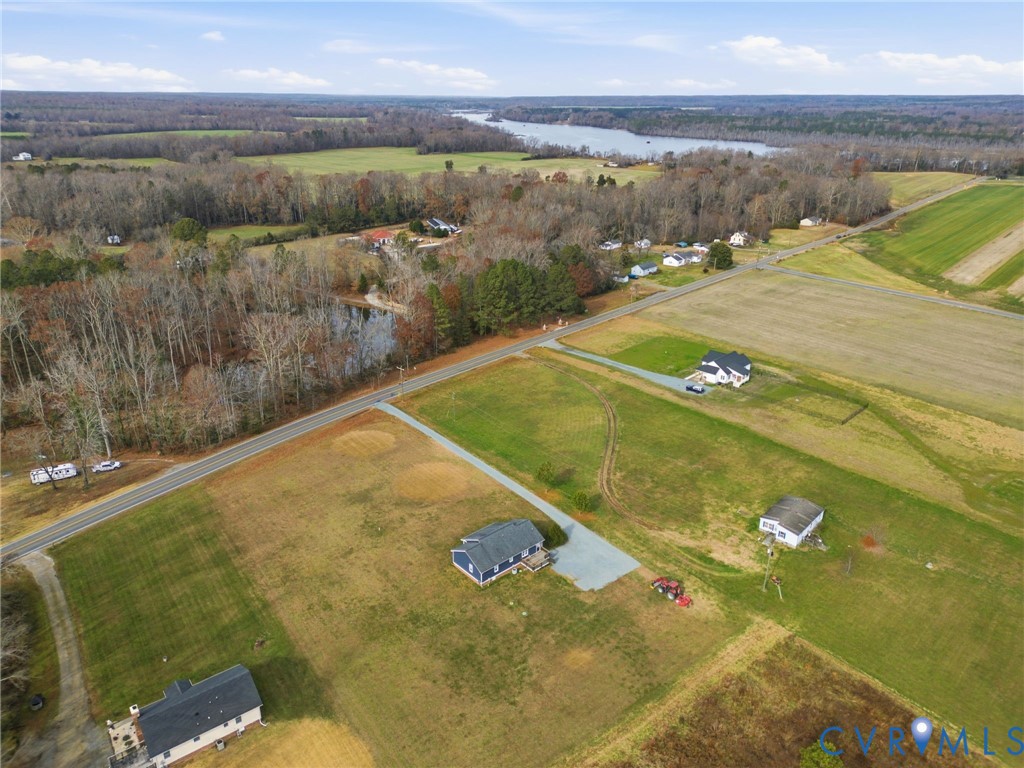 1220 Walkerton Road Walkerton, VA 23177 - Photo 32 of 33 a view of a swimming pool and an outdoor seating
