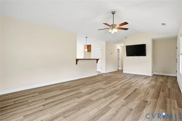a view of a livingroom with a flat screen tv