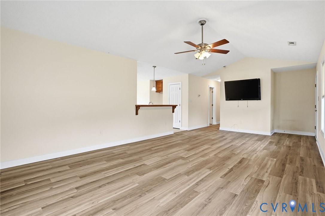 1220 Walkerton Road Walkerton, VA 23177 - Photo 7 of 33 a view of a livingroom with a flat screen tv