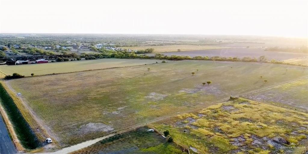 6393 Mile 3 1/2 W Road Weslaco, TX 78599 - Photo 3 of 3 a view of a lake view and mountain view