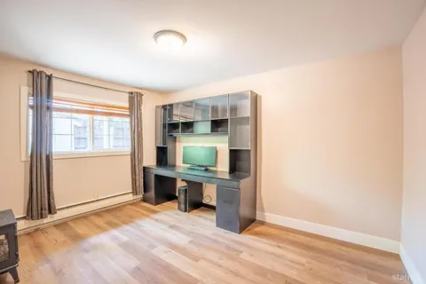a view of kitchen with furniture and window
